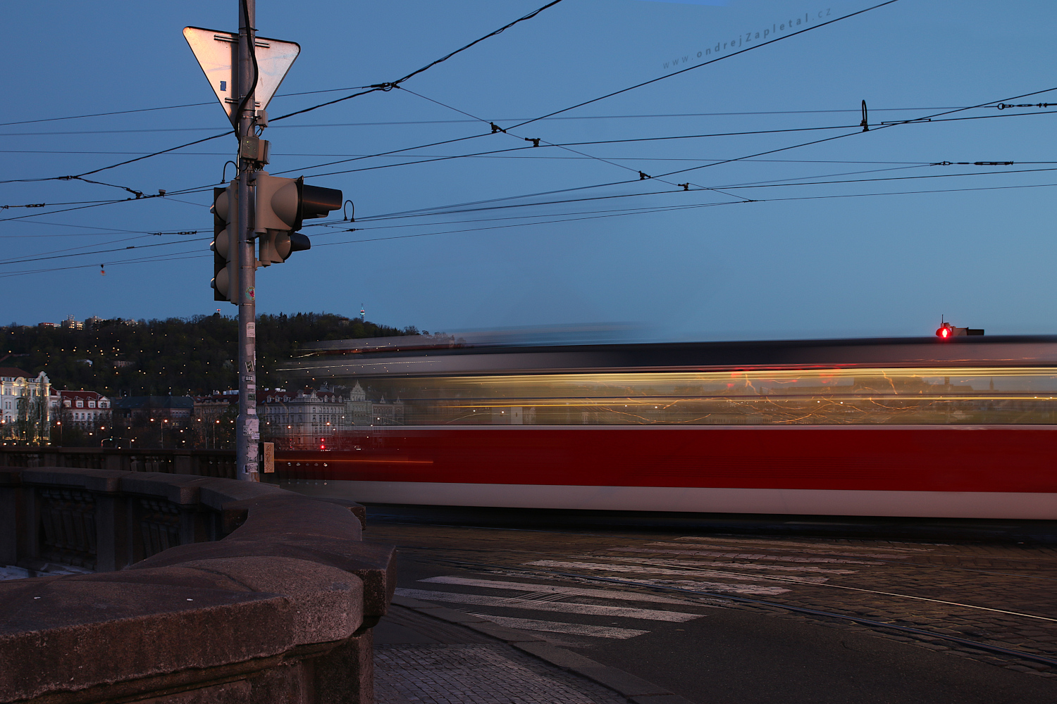 Tram going by (On the photo:  (Urban photography) tramvaj, ráno, ulice, praha)