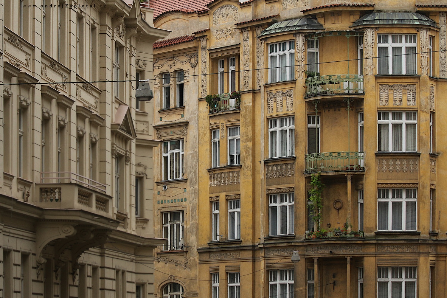 Balconys on the houses of the street (On the photo:  (Urban photography) budova, ulice, město, praha)
