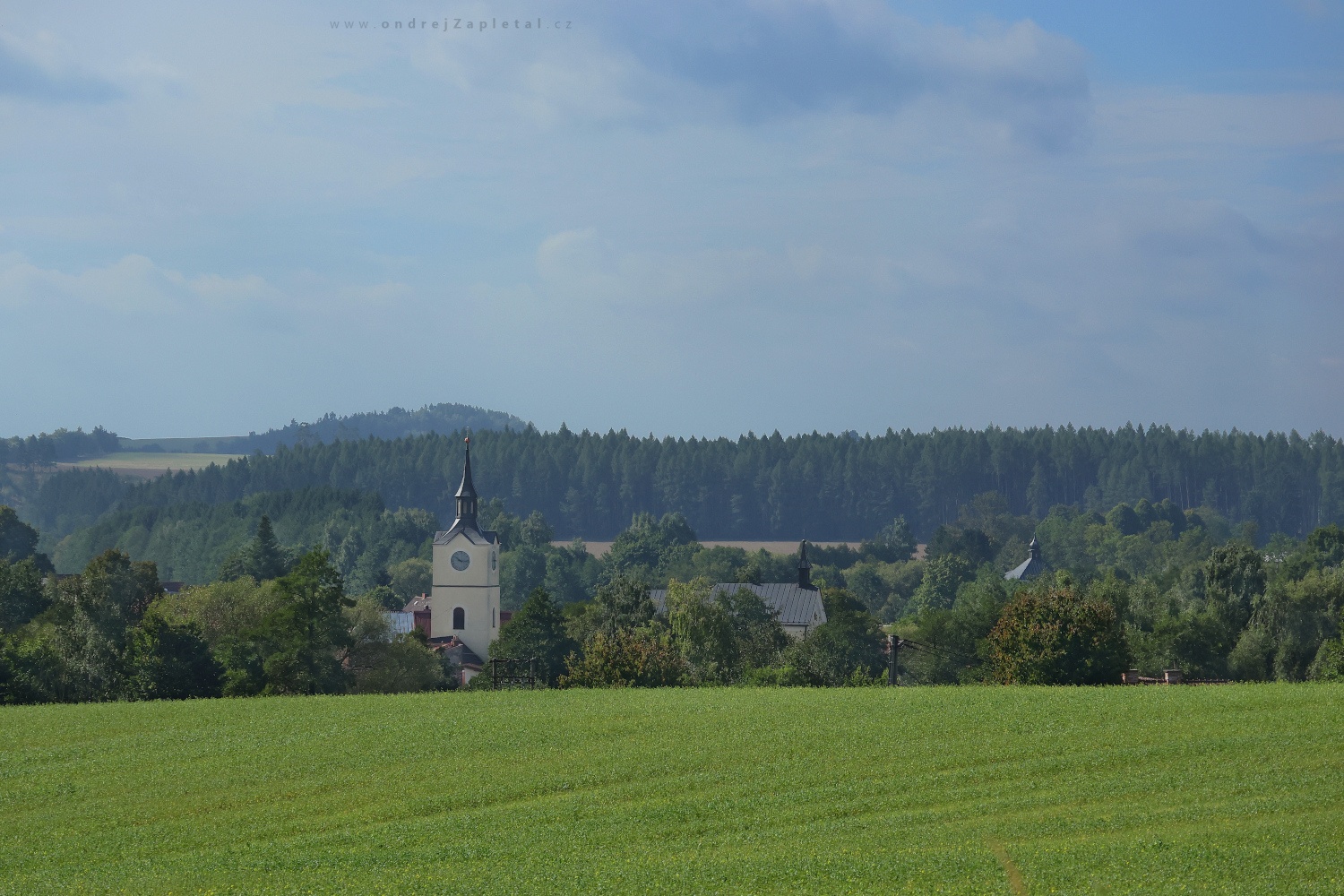 Church Tower between Hills (On the photo:  (Rural photography) kostel, věž, venkov, pole)