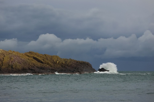 Waves against a Rock photography